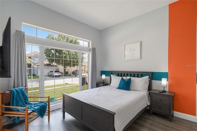 bedroom featuring dark wood-type flooring