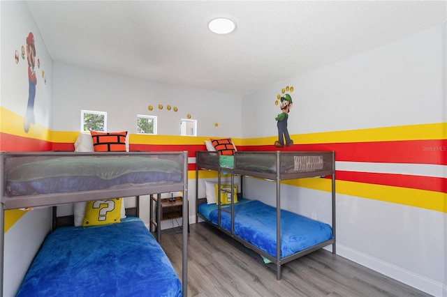 bedroom featuring hardwood / wood-style floors