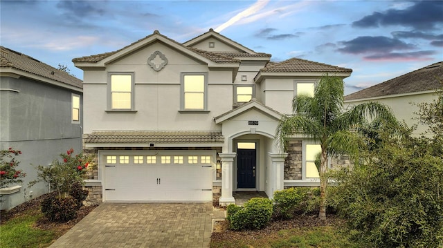 view of front of property featuring a garage