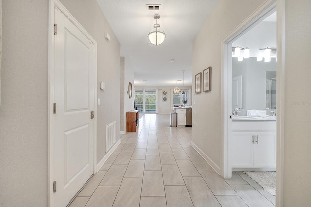 hall featuring sink