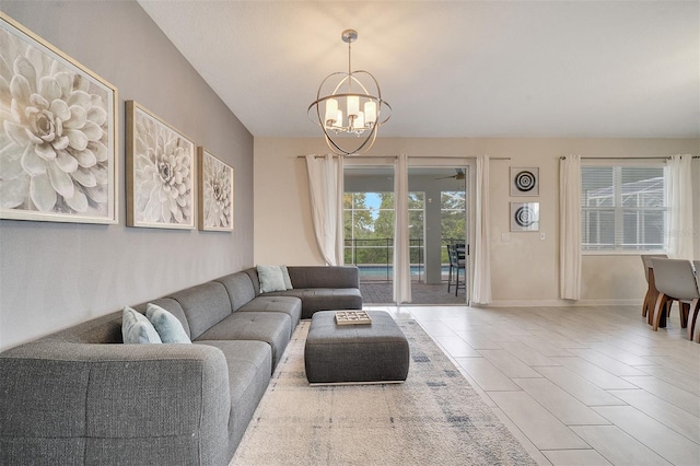 living room with an inviting chandelier