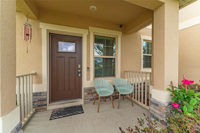 property entrance with a porch