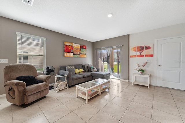 living room featuring light tile patterned floors