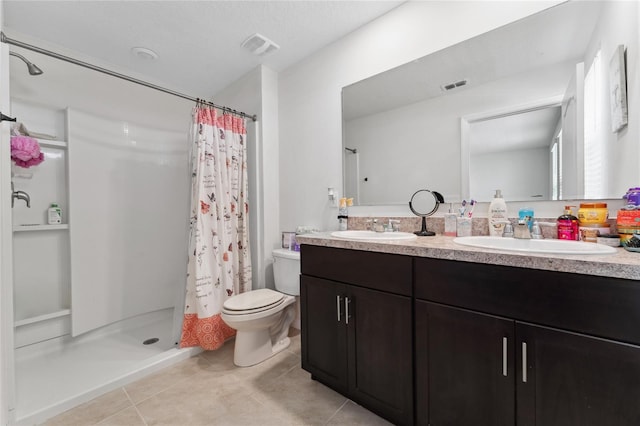 bathroom with walk in shower, vanity, toilet, and tile patterned floors