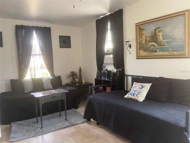 bedroom featuring light tile patterned flooring