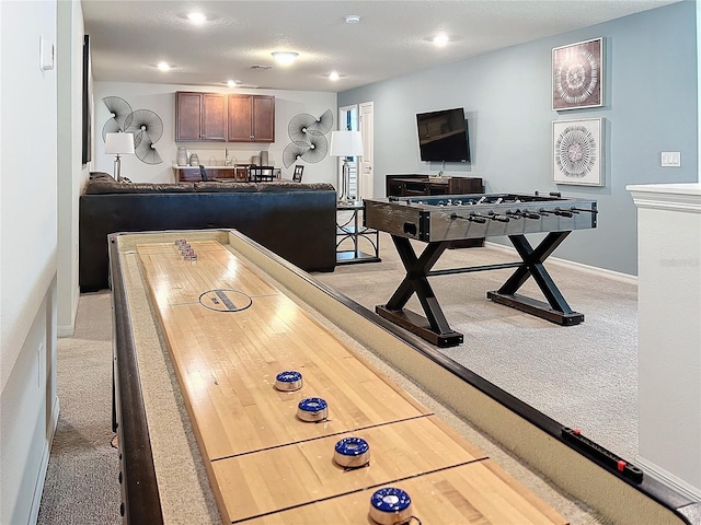 playroom with light colored carpet