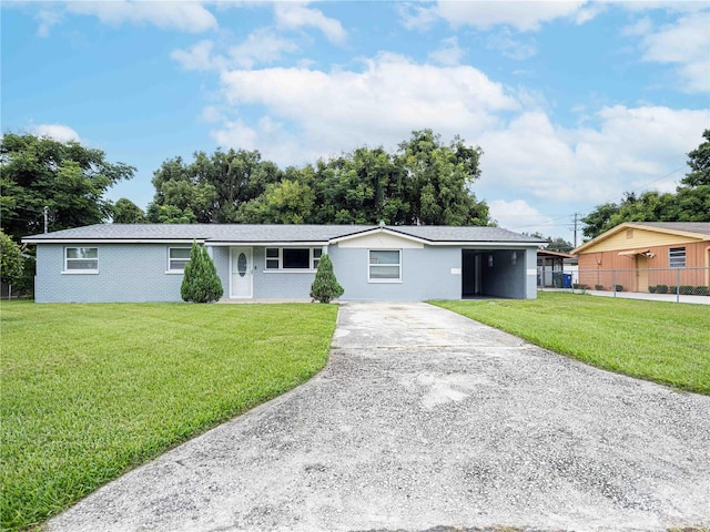 single story home featuring a front yard