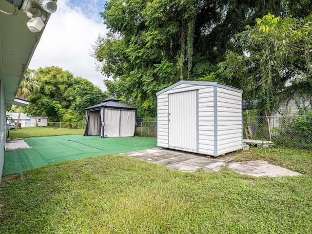 view of outbuilding with a lawn