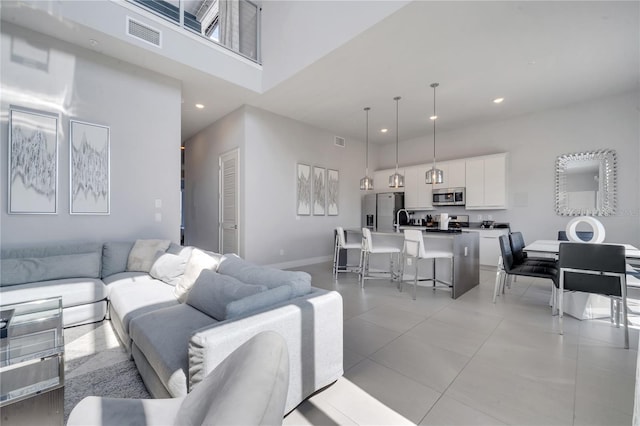 living room with light tile patterned floors