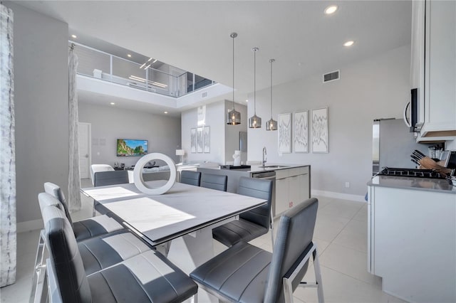 tiled dining space with sink