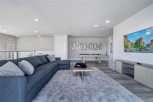 living room featuring dark wood-type flooring