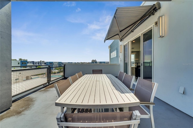 view of patio / terrace with a balcony