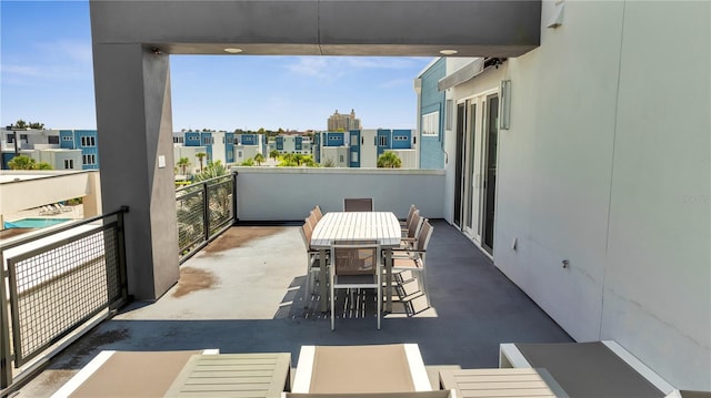 view of patio with a balcony