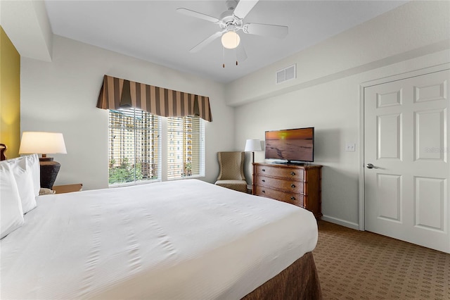 carpeted bedroom with ceiling fan