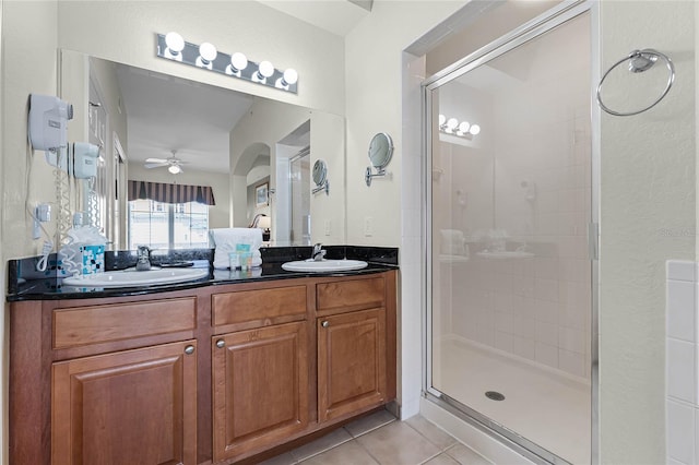 bathroom with vanity, ceiling fan, tile patterned floors, and an enclosed shower