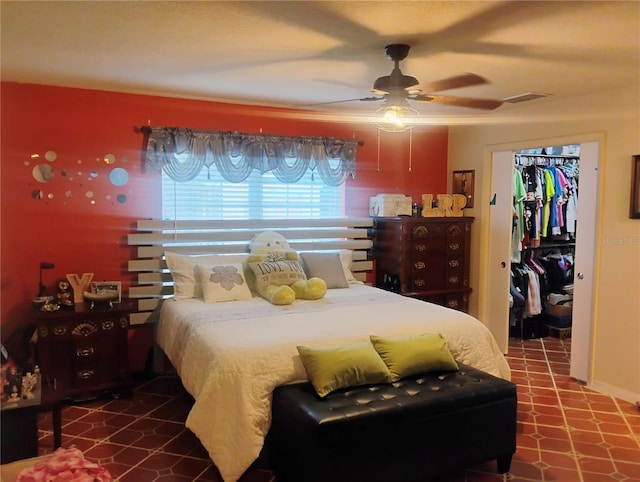 bedroom featuring a closet and ceiling fan