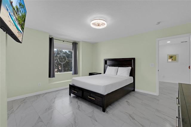 bedroom featuring a textured ceiling