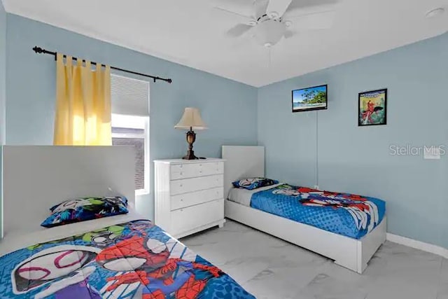 bedroom featuring ceiling fan