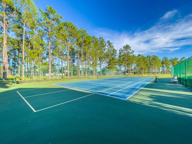 view of sport court featuring basketball hoop