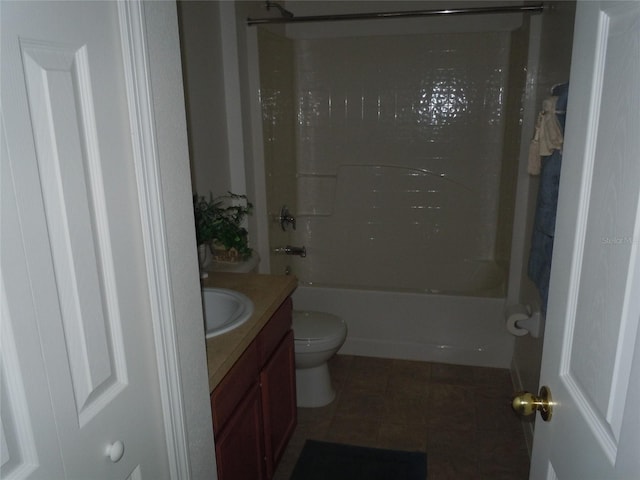 full bathroom with vanity, toilet, washtub / shower combination, and tile patterned floors