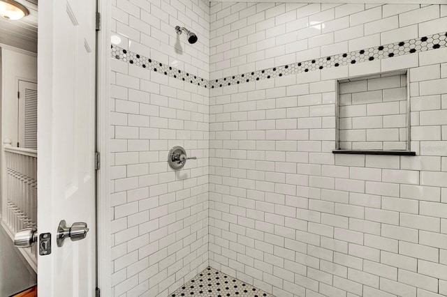 bathroom featuring tiled shower