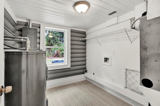 laundry area with hookup for a washing machine, water heater, and wooden ceiling