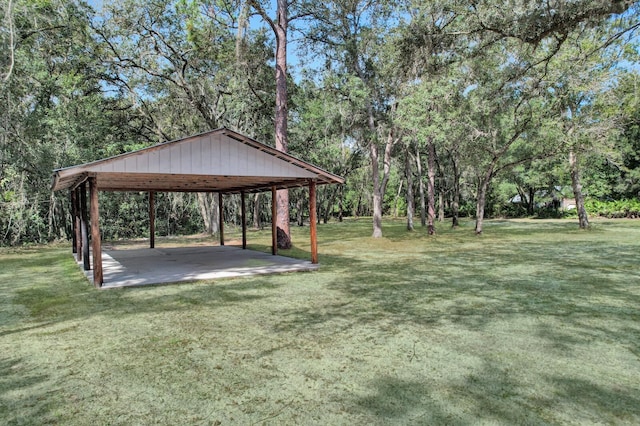 view of property's community with a lawn