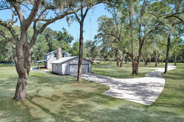 exterior space with an outbuilding and a yard