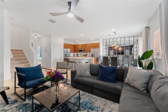 living room with ceiling fan