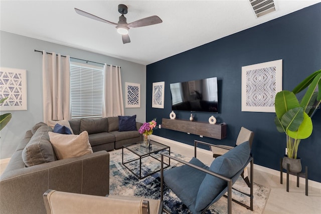 living room with ceiling fan