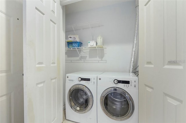 laundry area featuring washing machine and dryer