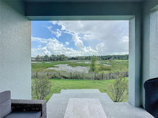 view of patio / terrace with a rural view