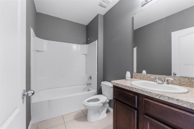 full bathroom featuring vanity, bathtub / shower combination, tile patterned floors, and toilet