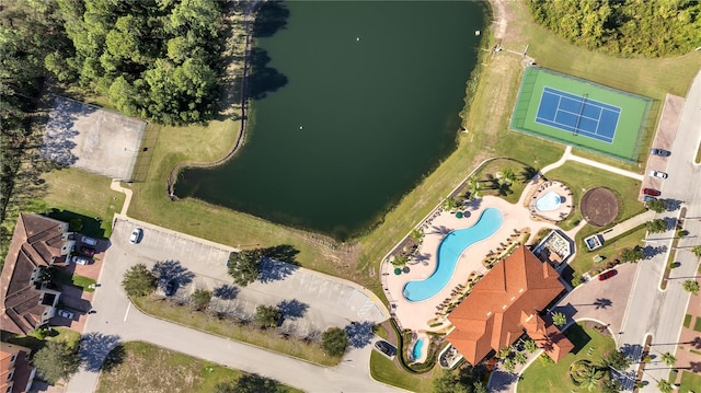 birds eye view of property featuring a water view