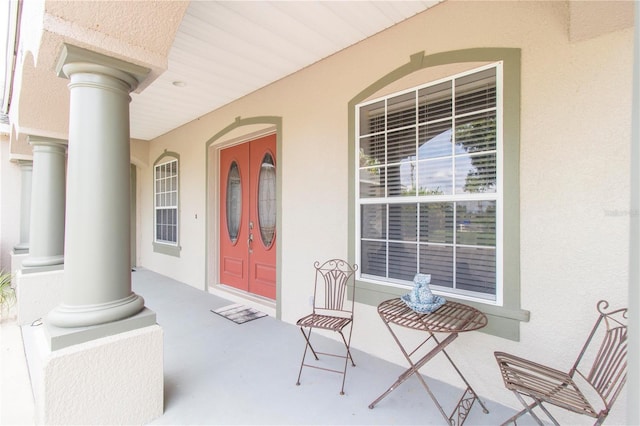 entrance to property with a porch