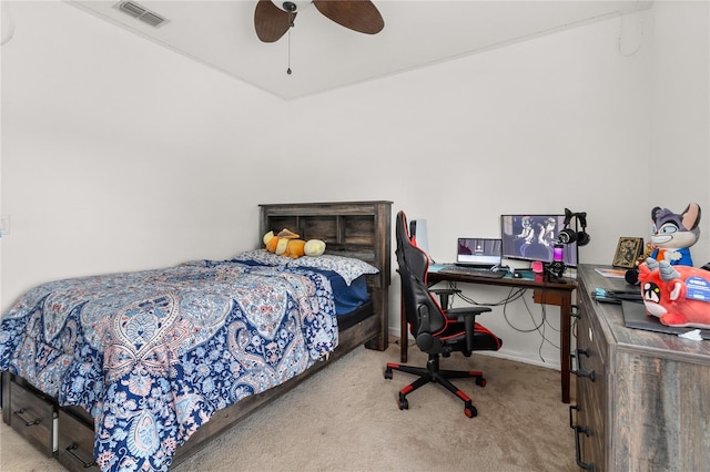 bedroom featuring ceiling fan and carpet