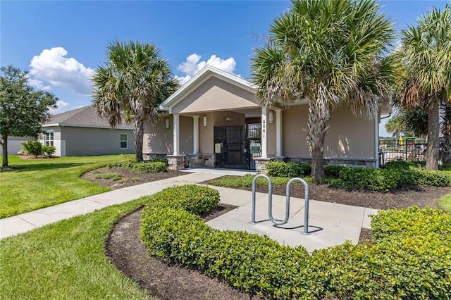 view of front of home with a front lawn