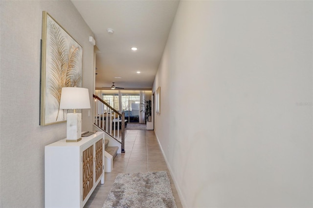 1842 Tropical Palms Cir, Kissimmee, FL 34747 - hall featuring stairs, recessed lighting, baseboards, and light tile patterned flooring