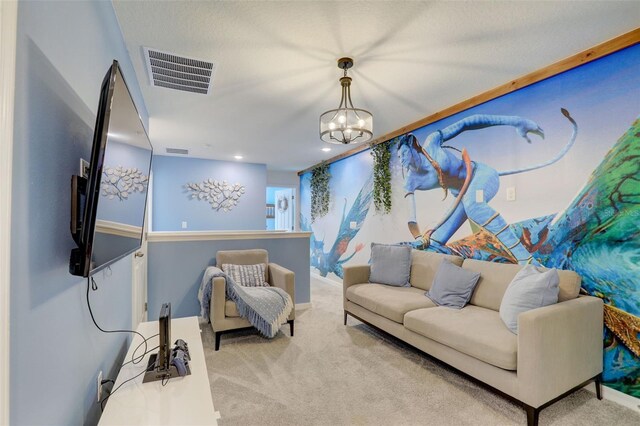 1842 Tropical Palms Cir, Kissimmee, FL 34747 - carpeted living room featuring a chandelier and recessed lighting