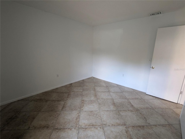 view of tiled empty room