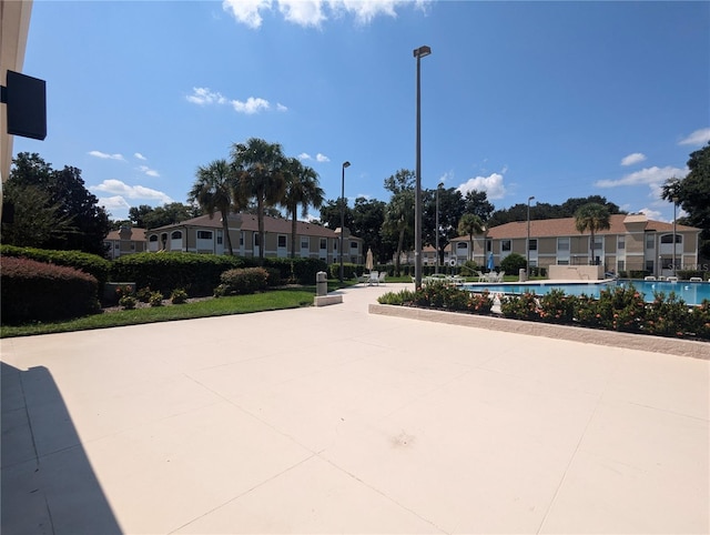 view of community featuring a patio and a pool