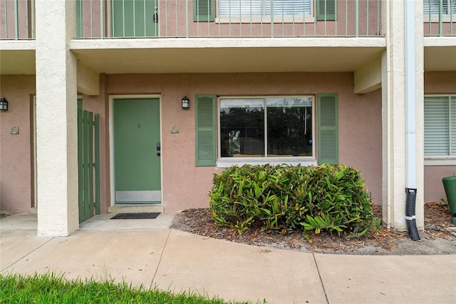 property entrance with a balcony