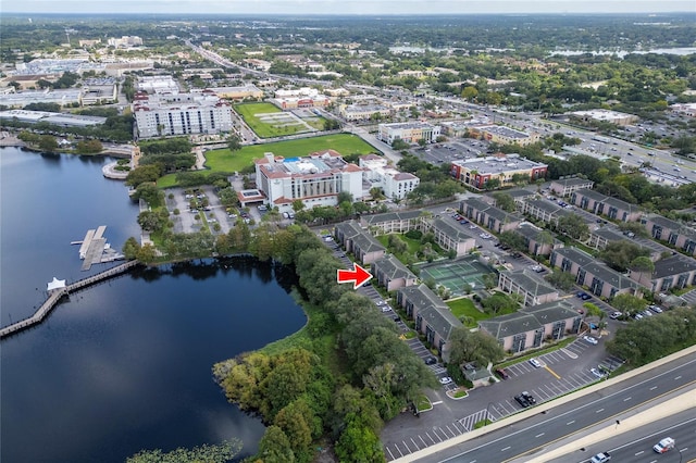 birds eye view of property with a water view