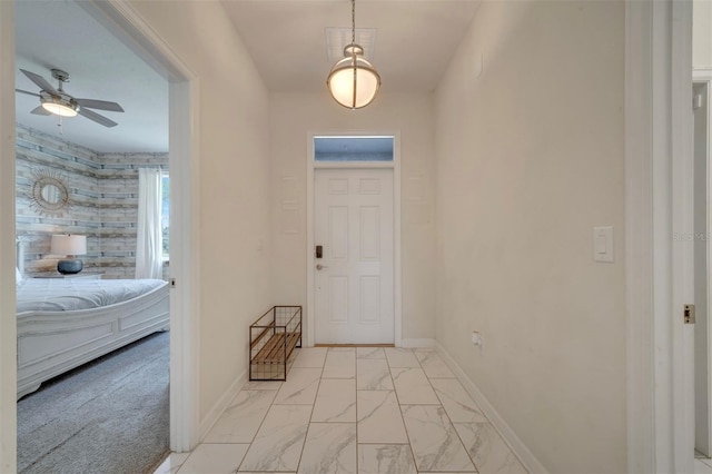 1536 Maidstone Ct, Davenport, FL 33896 - entrance foyer with marble finish floor, baseboards, and a ceiling fan