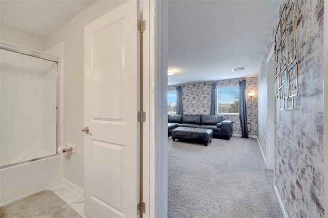 1536 Maidstone Ct, Davenport, FL 33896 - hallway with wallpapered walls, carpet floors, baseboards, and visible vents