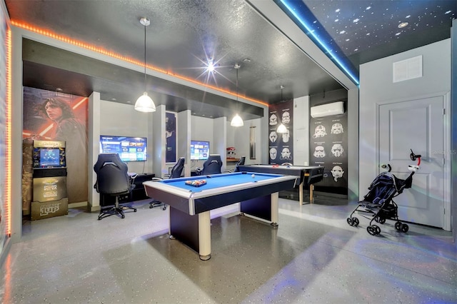 1536 Maidstone Ct, Davenport, FL 33896 - game room with a wall mounted AC, a textured ceiling, visible vents, speckled floor, and billiards