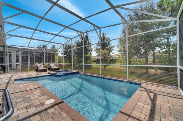 1536 Maidstone Ct, Davenport, FL 33896 - view of pool featuring a pool with connected hot tub, a lanai, and a patio area