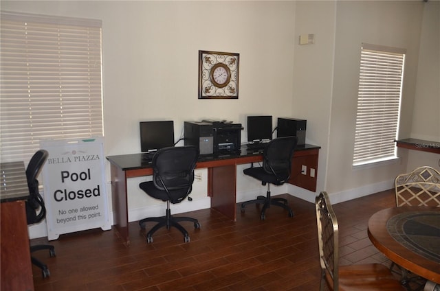 office area featuring dark wood-type flooring