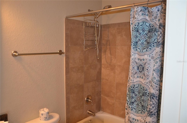 bathroom featuring shower / tub combo with curtain