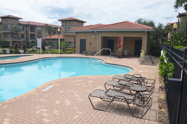 view of pool featuring a patio area